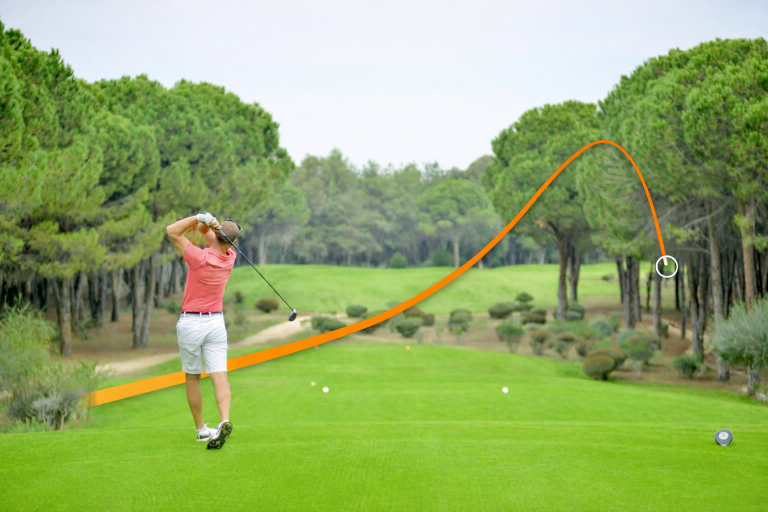Golf ball slicing to the right with driver